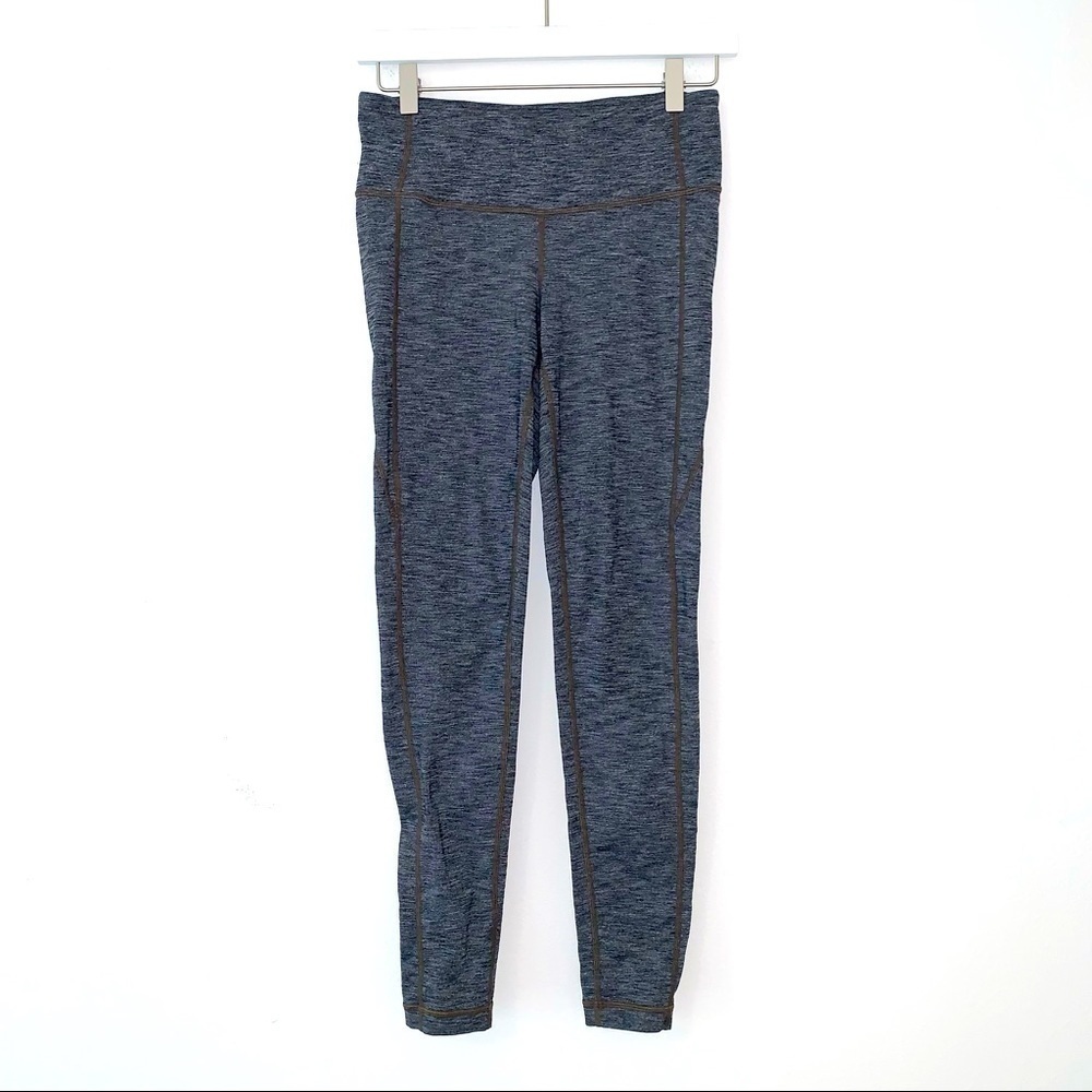 Athleta Revelation Tight in Heathered black/gray size small